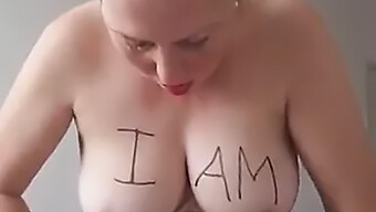 Slave To A Big Tit Milf