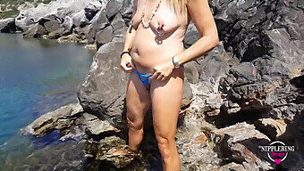 Amateur German Milf With Extreme Piercings Naked At Public Beach