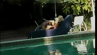 American Hunk Gives Poolside Blowjob To Horny Cutie